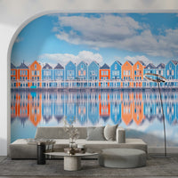 Aqua cottage row wall mural featuring calm coastal village view