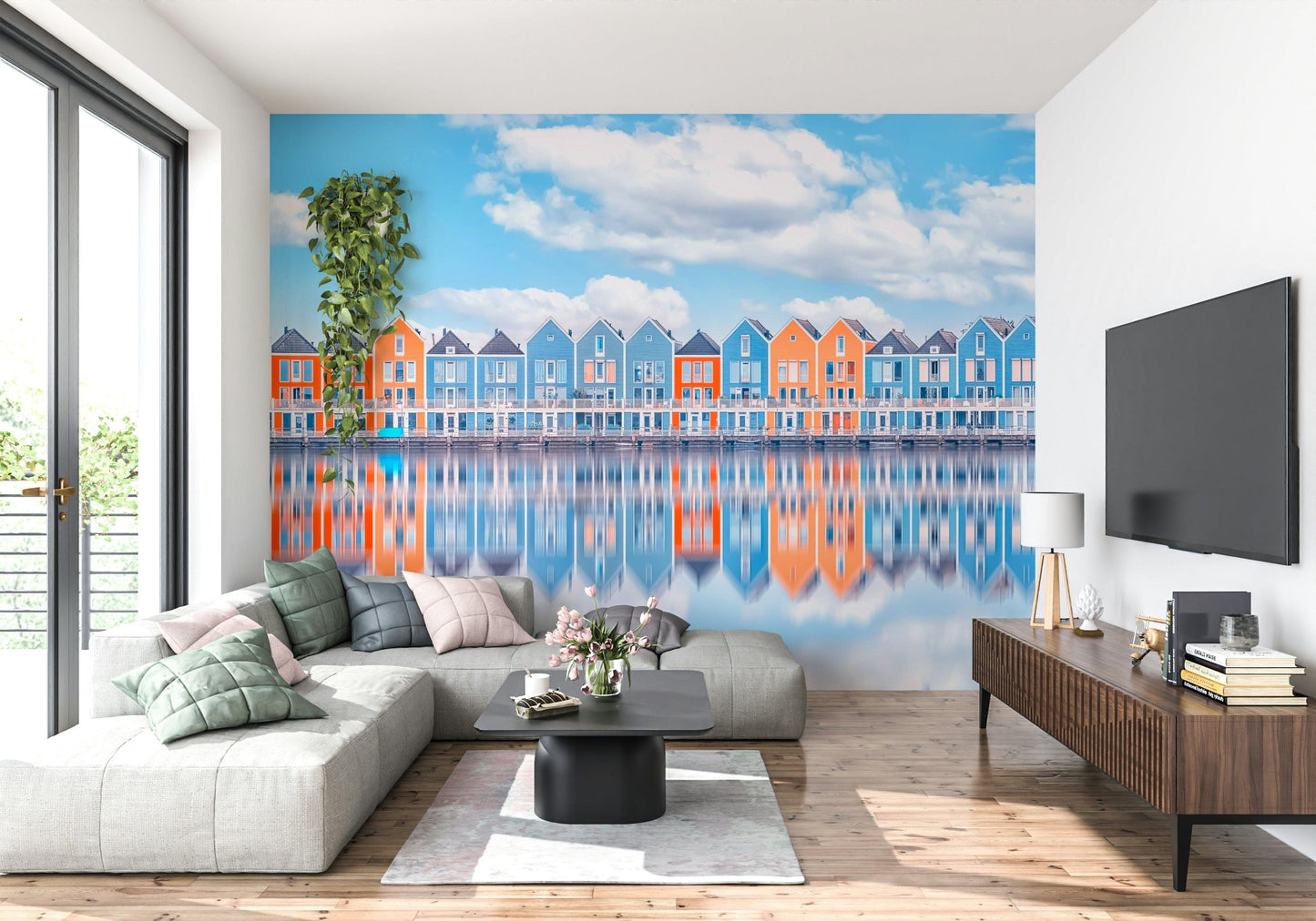 Coastal cottage row mural showing aqua and orange houses by the water