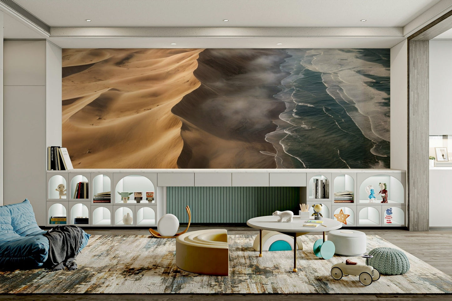 A wall mural of a desert next to the coast.

