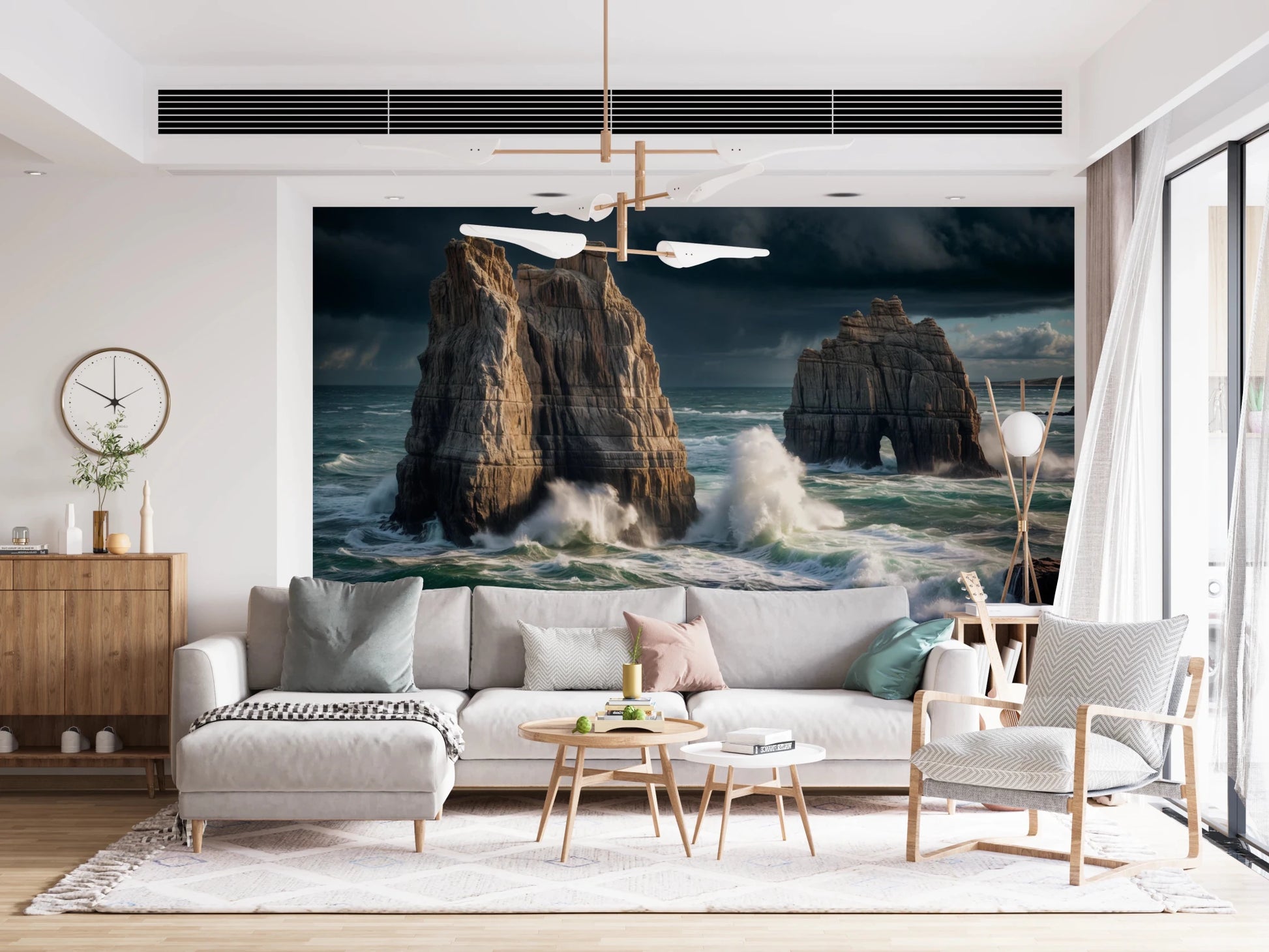 Coastal Giants wallpaper mural behind a large white sectional sofa with colorful pillows in a living room