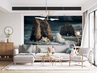 Coastal Giants wallpaper mural behind a large white sectional sofa with colorful pillows in a living room
