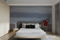 Coastal Hideaway Wall Mural featuring a red cabin by the sea.

