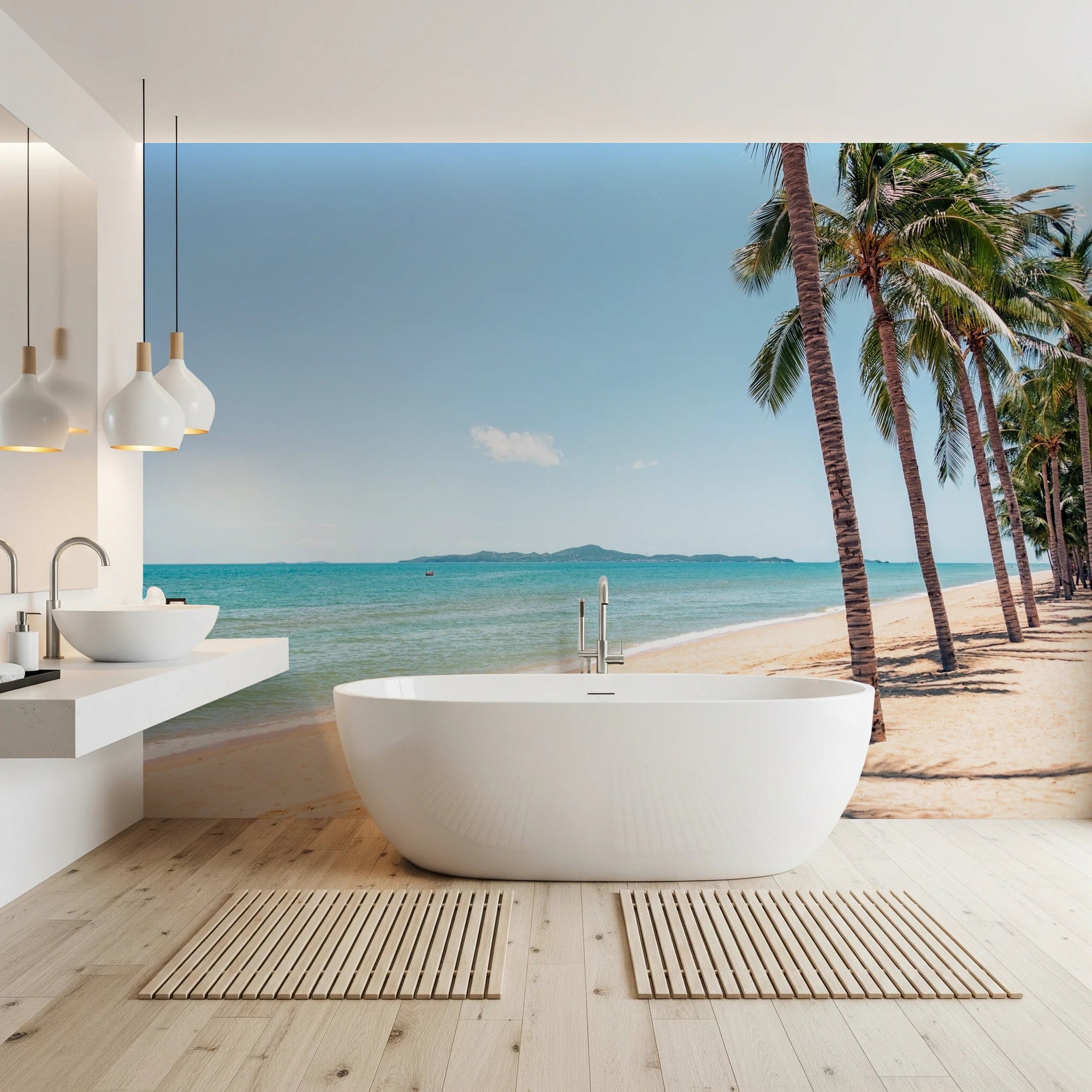 Coastal Palm Serenity wallpaper mural of a turquoise beach and palms behind a freestanding white tub in a bathroom