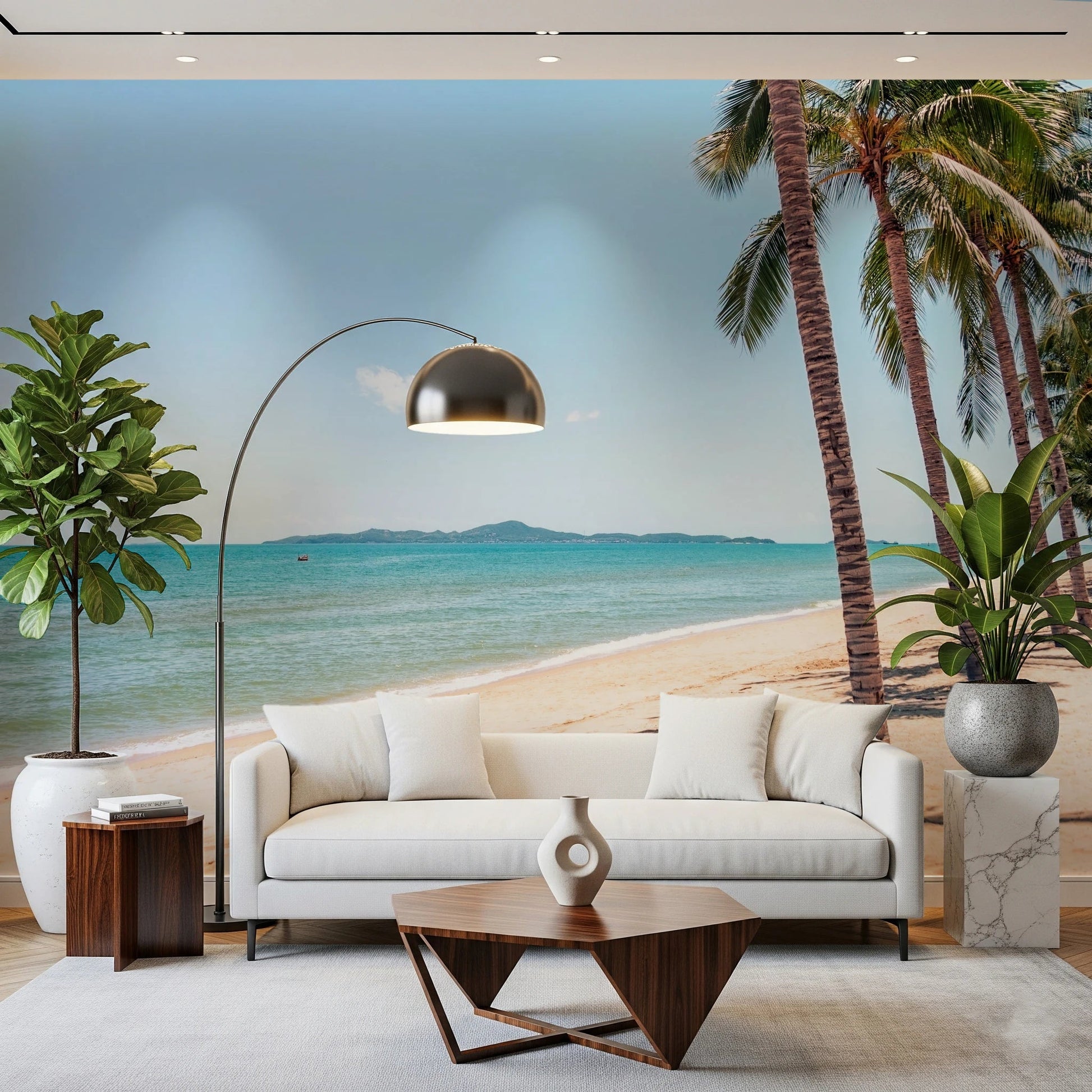 Coastal Palm Serenity wallpaper mural of a turquoise shore behind a white sofa and chrome arc lamp in a living room