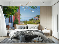 Sunny Mediterranean alleyway scene on a Coastal Path Charm Wall Mural.
