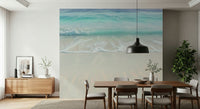 Coastal Paradise Wall Mural in flat dining area, light timber table, relaxed palette