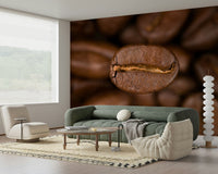 The wallpaper uses a close-up of roasted coffee beans to bring depth, texture, and earthy tones to the wall.