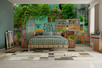 Scene with a mix of colorful walls and green plants.

