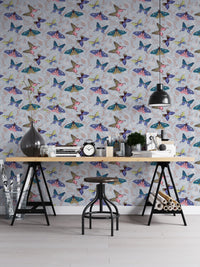 Temporary butterfly pattern wallpaper mural in a workspace for a damage-free and lively professional transformation.