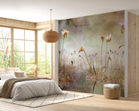 Colorful Freesia Floral Watercolor wallpaper mural in a bedroom with grey bedding, a rattan pendant and corner windows