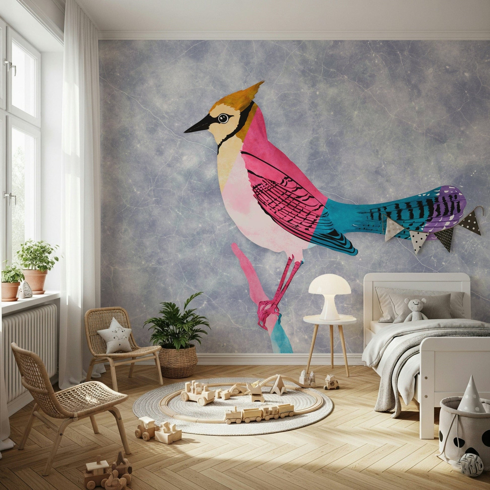 Colorful Jay wall mural of a crested bird on blue above two rattan chairs and wood toys in a kids room