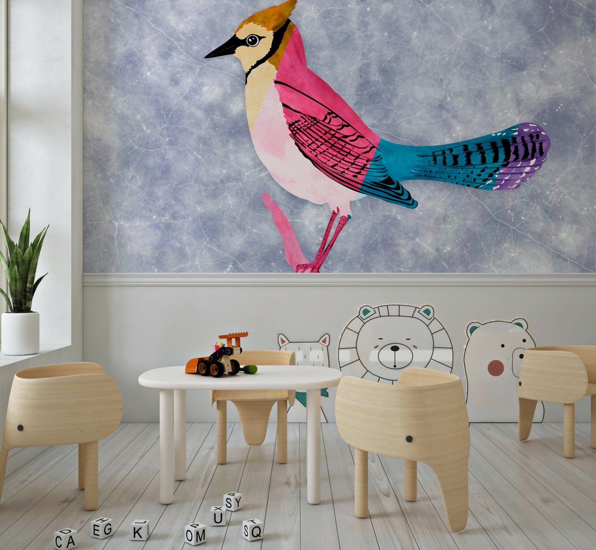 Colorful Jay wall mural of a crested bird on blue above animal-shaped chairs in a kids playroom