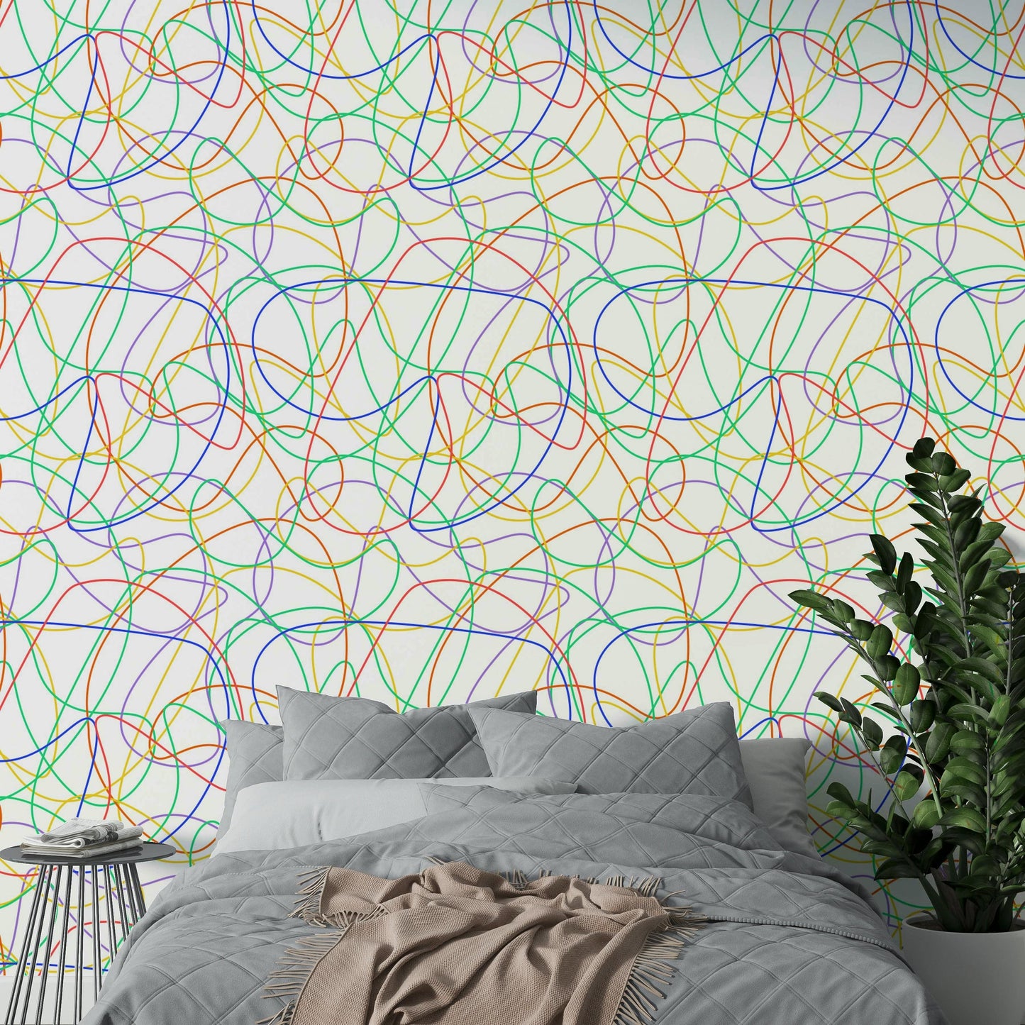 Minimalist apartment bedroom styled with colorful linear wall art.
