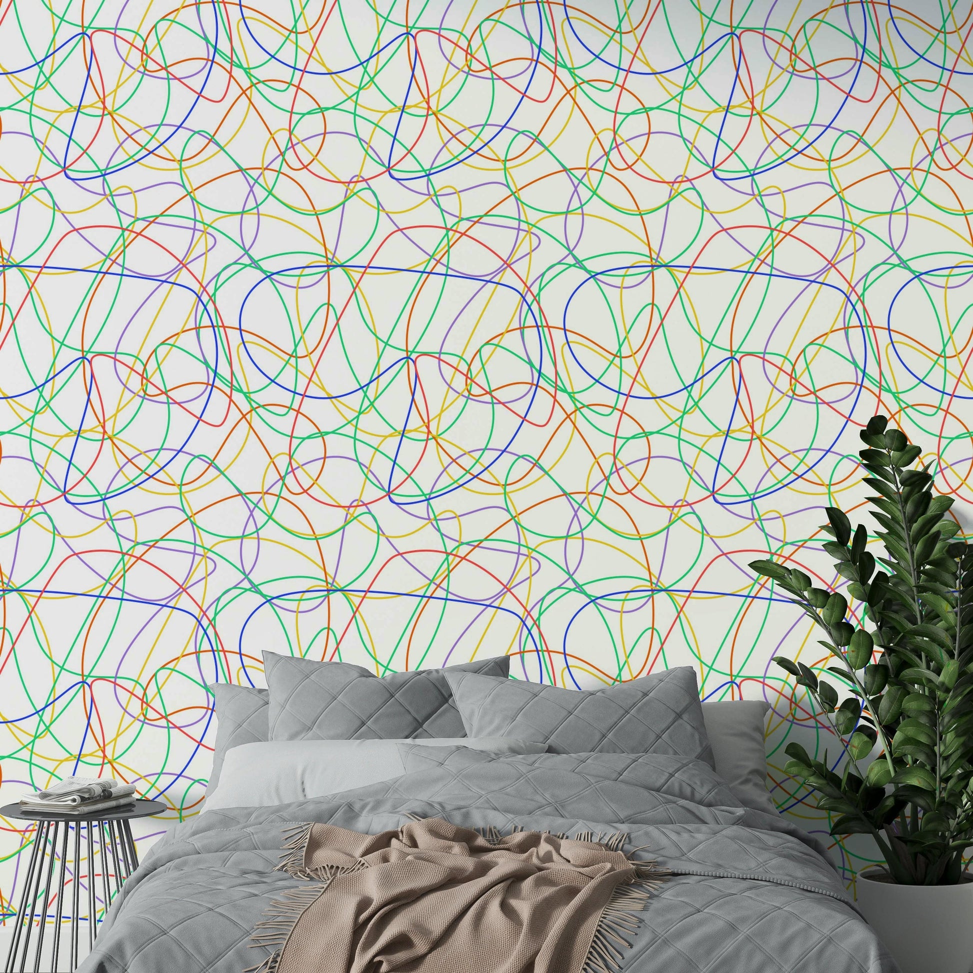 Minimalist apartment bedroom styled with colorful linear wall art.