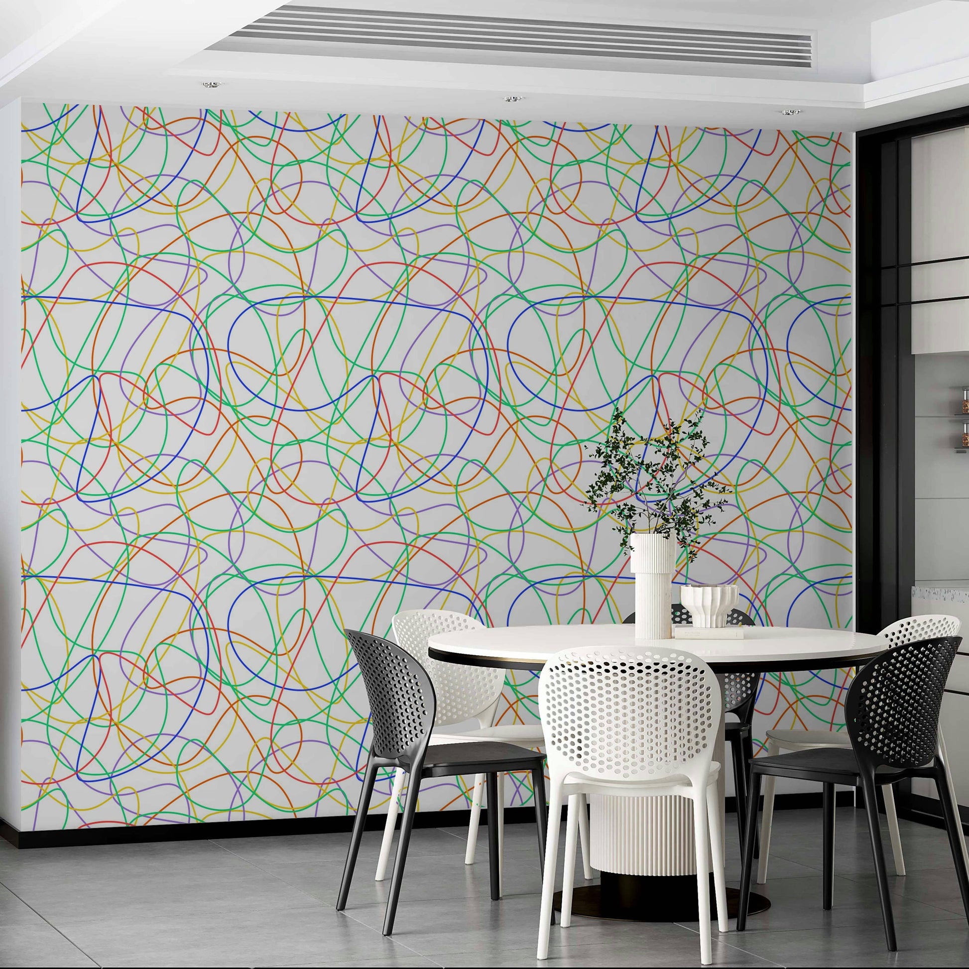 Modern nursery featuring soft pastel line patterns on a focal wall.