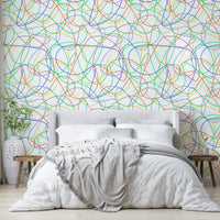 Colorful Line Print Wallpaper used as a creative accent in a lounge.
