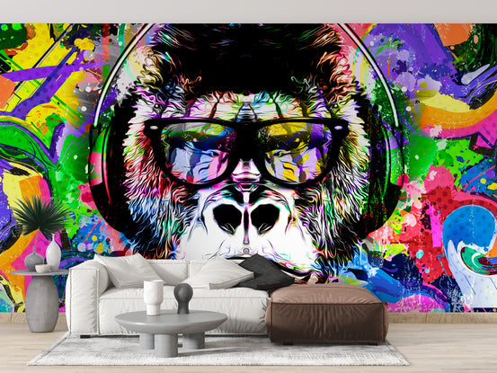 Colorful Monkey Graffiti wallpaper mural of a pop-art gorilla in sunglasses above a white living room sofa