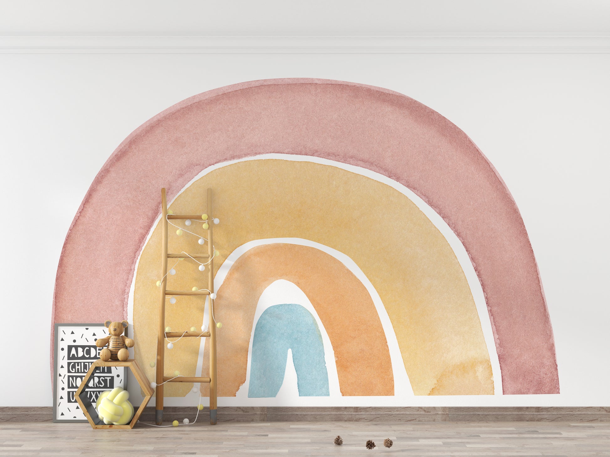 Watercolor Rainbow Colorful wallpaper mural with a blue center arch beside a wood ladder and teddy bear in a kids room