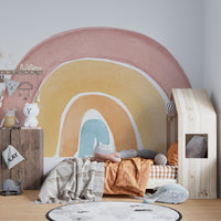 Playful watercolor rainbow mural