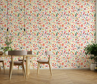 Eclectic wall décor featuring plant and coral tones


