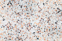 Vibrant Light Coral Terrazzo mural surface abstract composition playful stone particles.