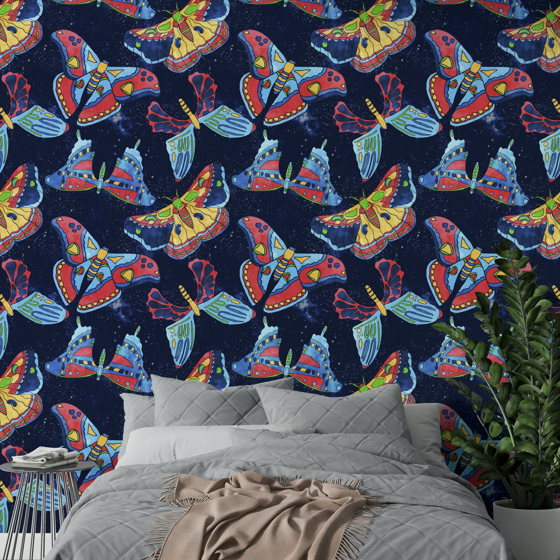Moody moth mural in deep space-inspired tones

