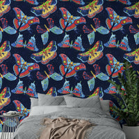 Moody moth mural in deep space-inspired tones

