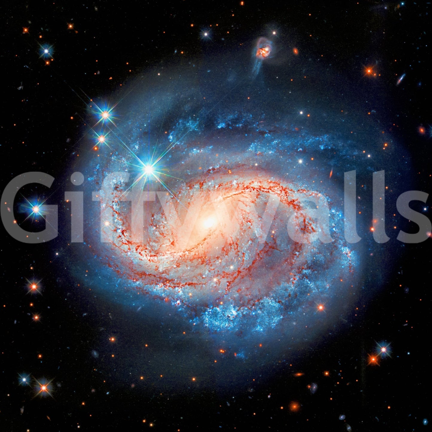 Cosmic Symphony wallpaper mural close-up of the red-cored blue spiral galaxy and bright stars on black space