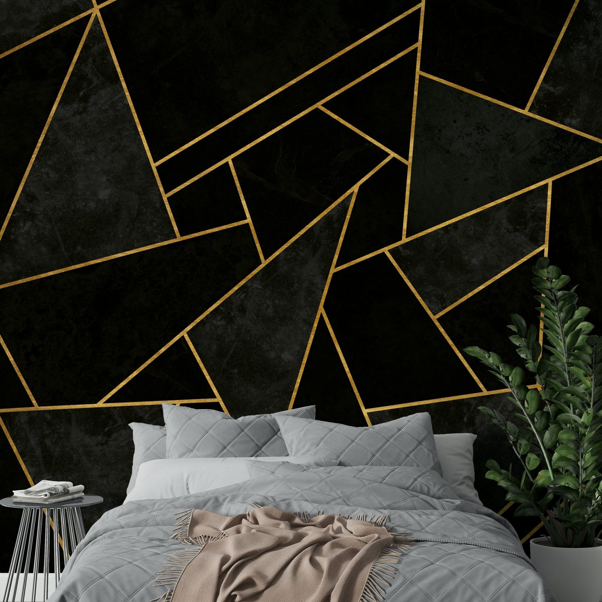 Luxurious black mosaic mural with intricate, cracked design

