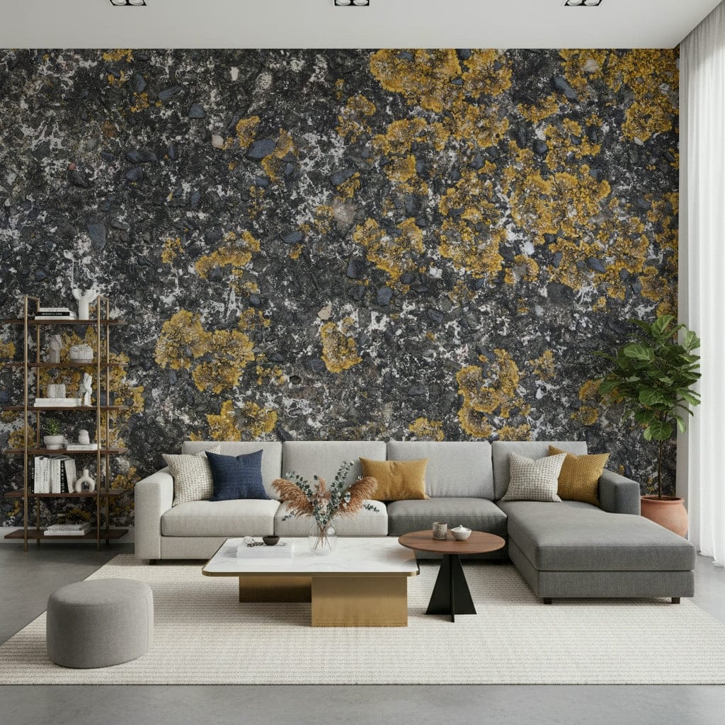 Cracked Stone wallpaper mural of grey rock with gold lichen behind a grey sectional sofa and bookshelf