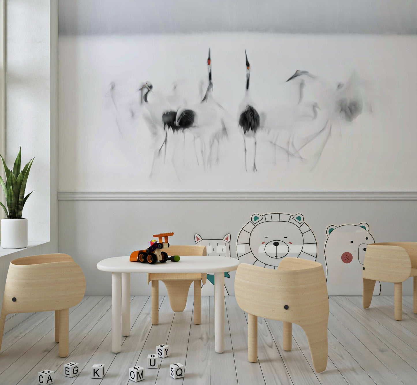 Crane Dance in White wallpaper mural of soft grey cranes above an elephant-shaped chair set in a kids play area