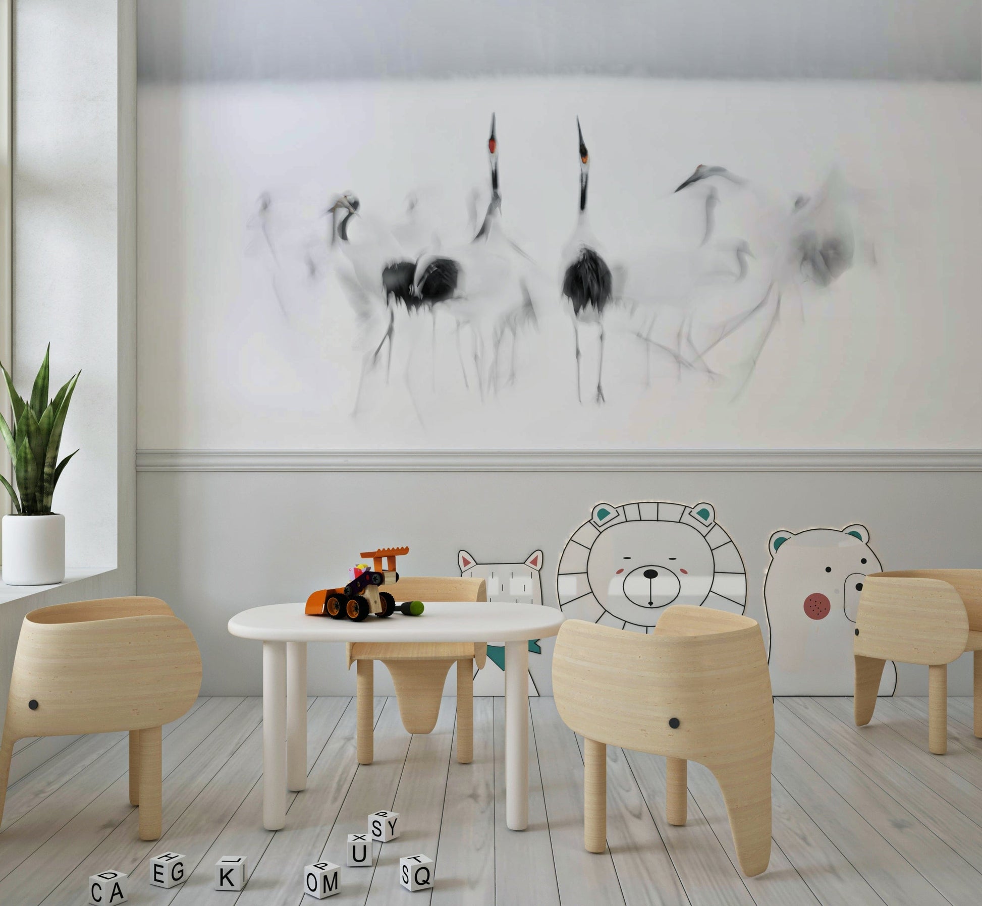 Crane Dance in White wallpaper mural of soft grey cranes above an elephant-shaped chair set in a kids play area