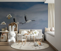 Entryway wall mural showing cranes flying over water, modern wall decor for apartment