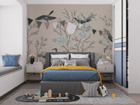 Cream Color Crane Birds on the Vintage Tree wallpaper mural with blue birds behind a grey kids bed with bunting