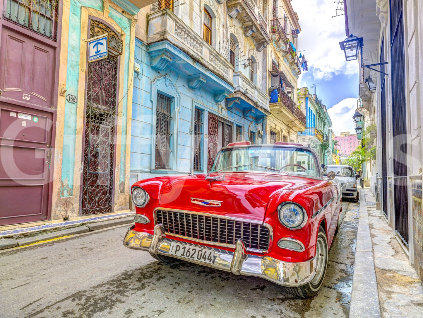 Tropical Cuban cruise mural with sunset and water views

