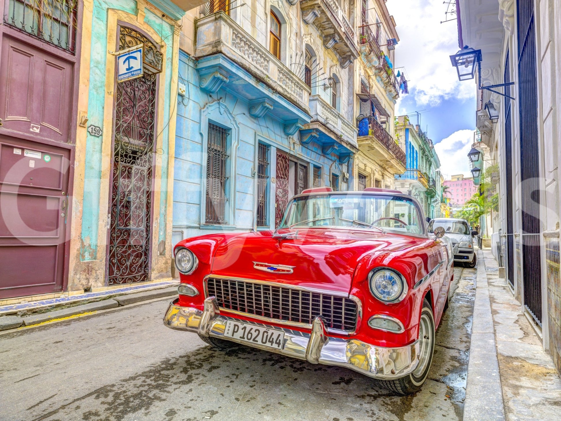 Tropical Cuban cruise mural with sunset and water views

