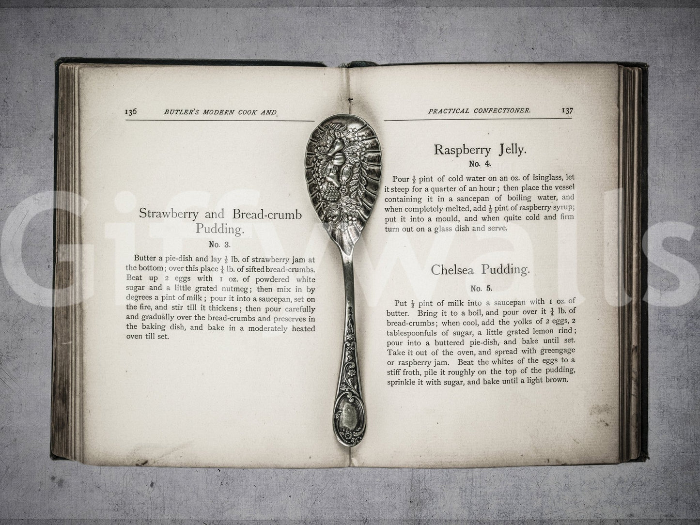 Culinary Antiques wall covering featuring worn book edges and silver details.