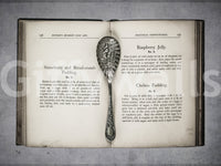 Culinary Antiques wall covering featuring worn book edges and silver details.