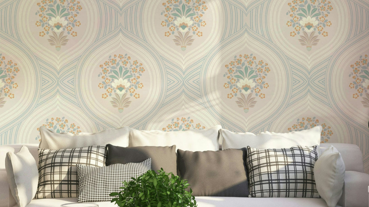 Curved Lines & Blooms wallpaper behind a cream sofa with plaid and grey pillows in a sunny living room