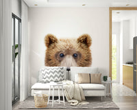 Snuggly baby bear mural in neutral nursery style

