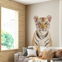 Cartoon-style baby tiger mural in warm tones

