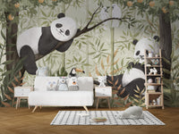 Peaceful Panda Canopy wallpaper mural of pandas in bamboo behind a white sofa with plush toys and ladder shelf