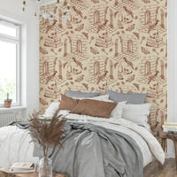 Amber toile wall mural with fine brown illustrations

