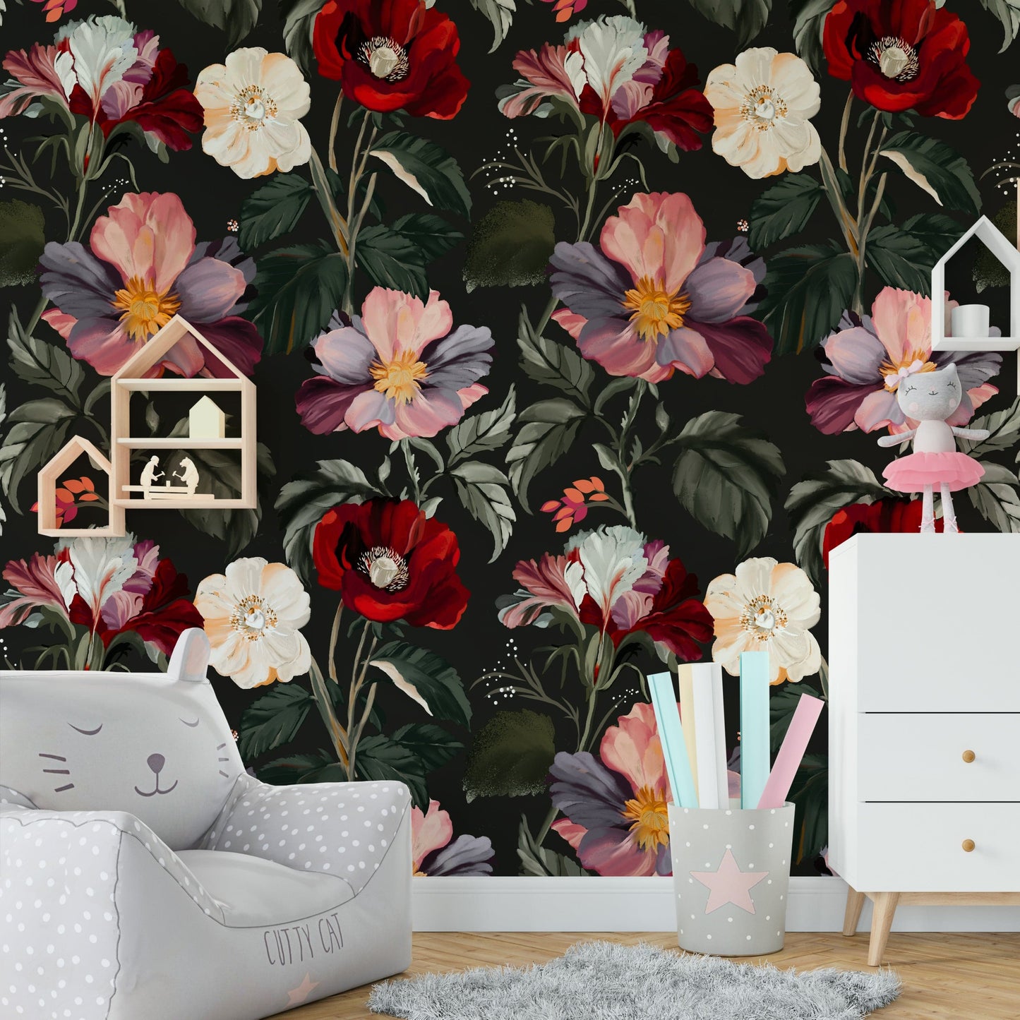 A beautiful modern living room with a dark floral mural.