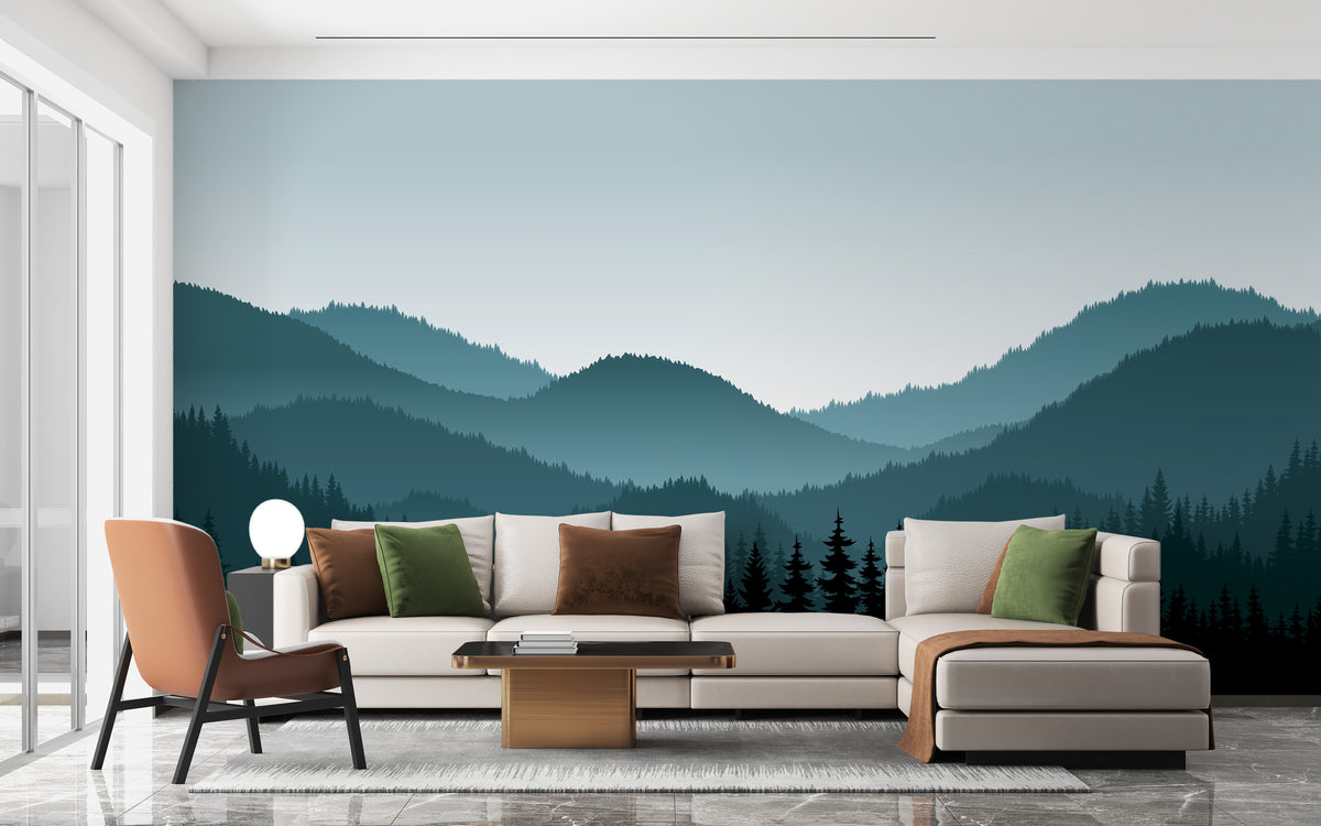 Dark Foggy Mountains wallpaper mural in teal behind a cream sectional sofa and terracotta armchair in a living room