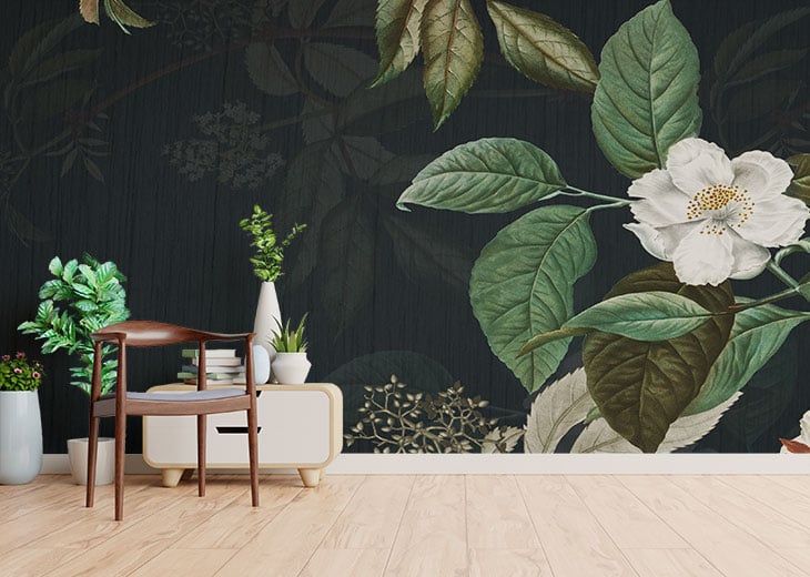Dark Green Floral wallpaper mural styled as a feature wall behind a dining table and chairs in green tones
