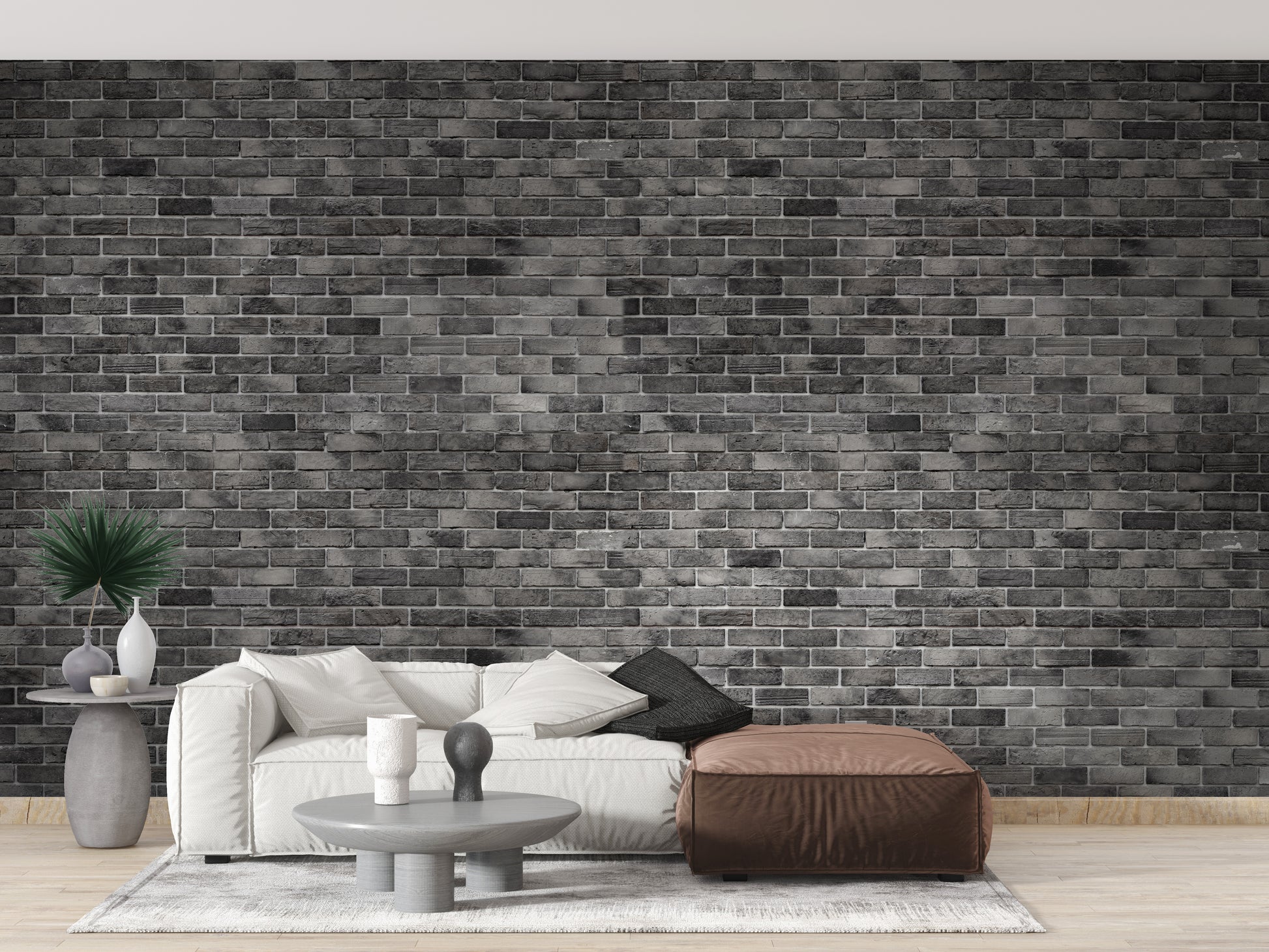 Dark Grey Brick Textured wallpaper mural styled as a feature wall behind a dining table and chairs in black tones