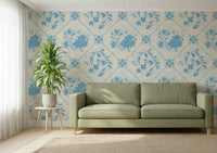 Delft-style bloom wallpaper in nursery, soft blue florals, gentle pattern for wall decor
