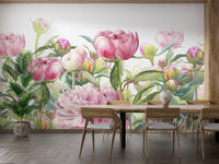 Delicate Peonies wallpaper mural styled as a feature wall behind a dining table and chairs in pink tones