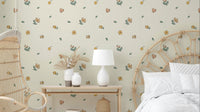 Delicate watercolor floral wallpaper in soft hues

